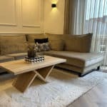 Eikenhouten salontafel Jent met speels onderstel